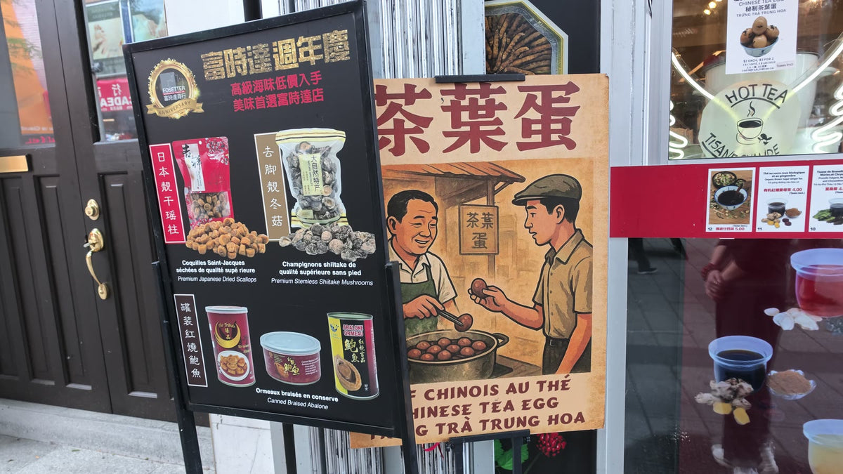 Fosetter's Chinese tea egg poster and anniversary sign outside the shop on De La Gauchetière Street.