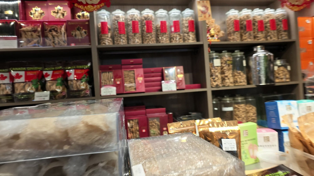 Shelves of Canadian ginseng jars and gift boxes at Fosetter in Montreal Chinatown
